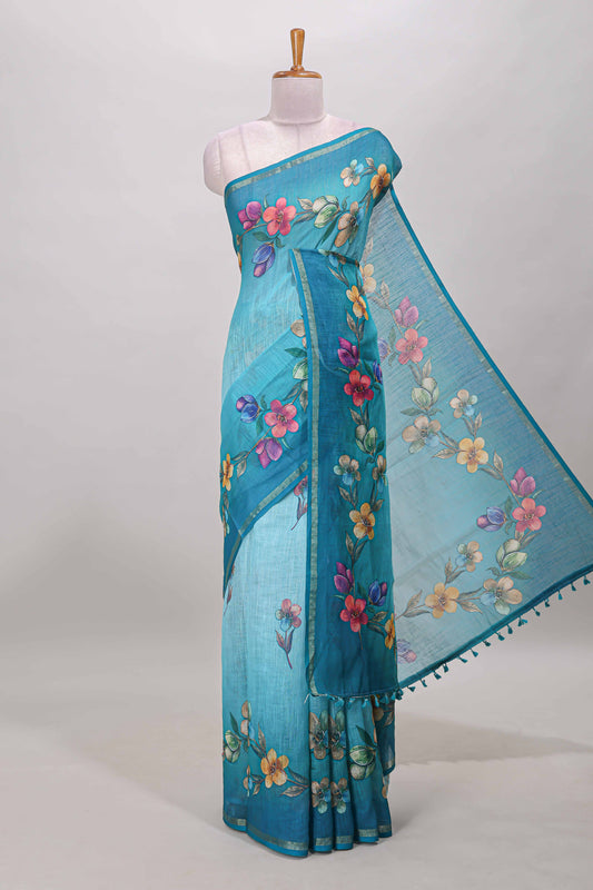 Turquoise green floral vine design linen cotton saree with self zari border and matching printed blouse