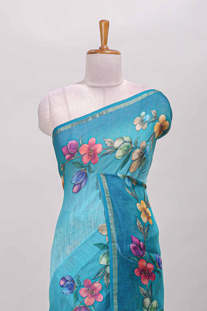 Turquoise green floral vine design linen cotton saree with self zari border and matching printed blouse
