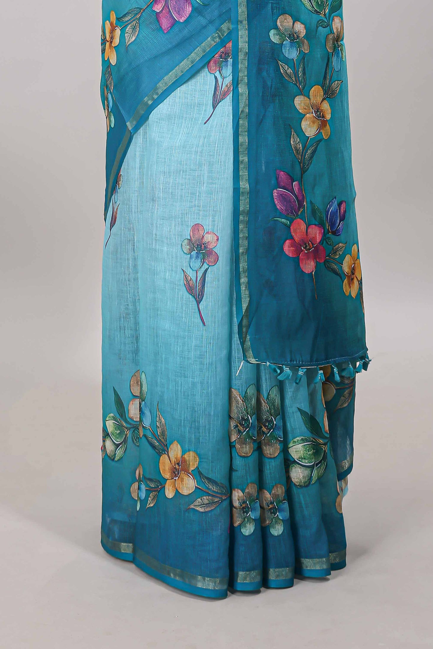 Turquoise green floral vine design linen cotton saree with self zari border and matching printed blouse