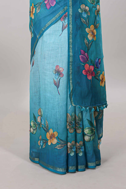 Turquoise green floral vine design linen cotton saree with self zari border and matching printed blouse