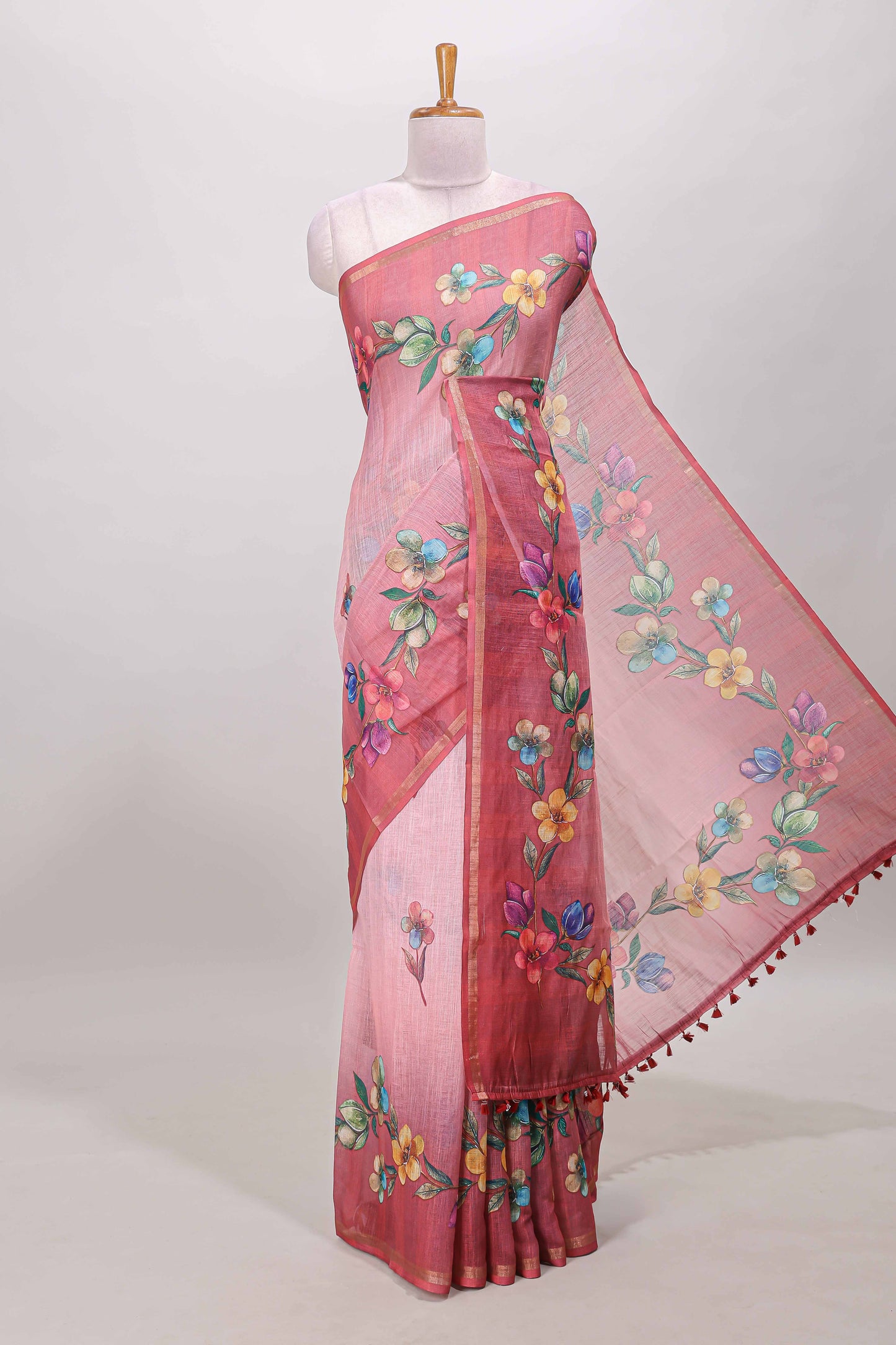 Pink floral vine design linen cotton saree with self zari border and matching printed blouse