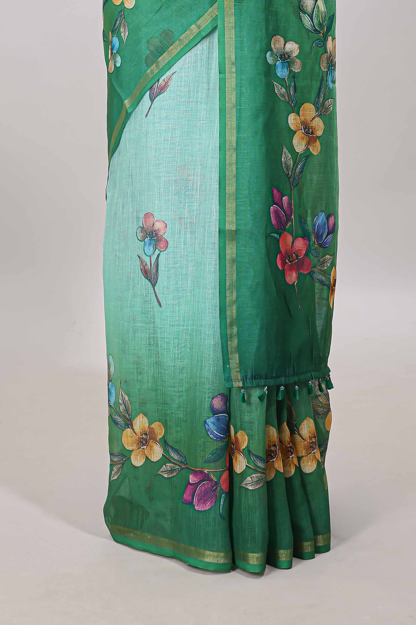 Green floral vine design linen cotton saree with self zari border and matching printed blouse