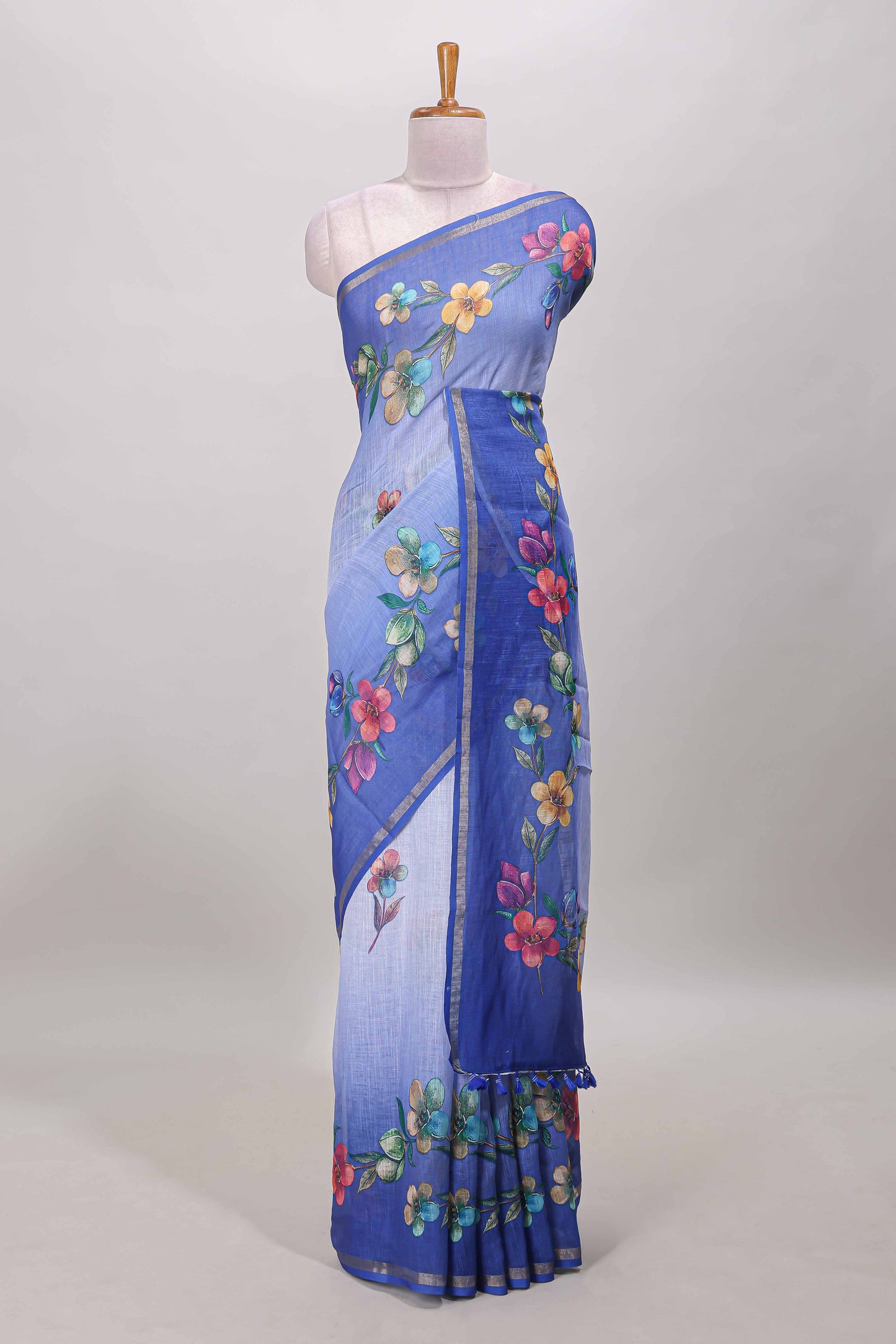 Blue floral vine design linen cotton saree with self zari border and matching printed blouse