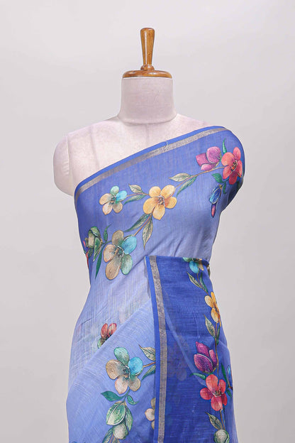 Blue floral vine design linen cotton saree with self zari border and matching printed blouse