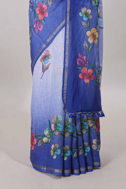Blue floral vine design linen cotton saree with self zari border and matching printed blouse