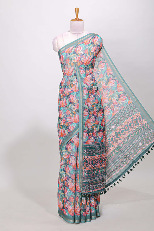 Green linen cotton saree with floral design and Ikkat motif pallu
