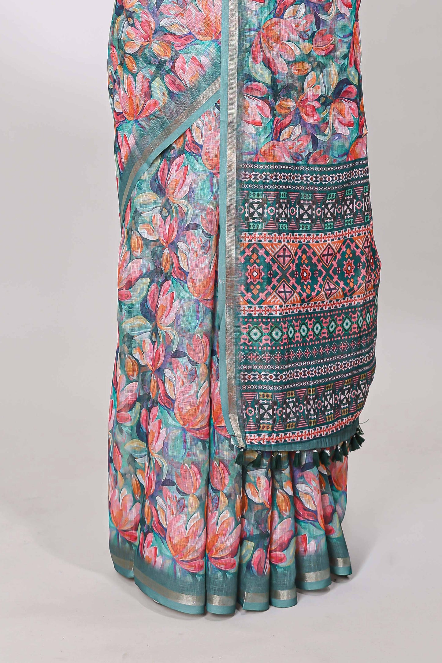 Green linen cotton saree with floral design and Ikkat motif pallu