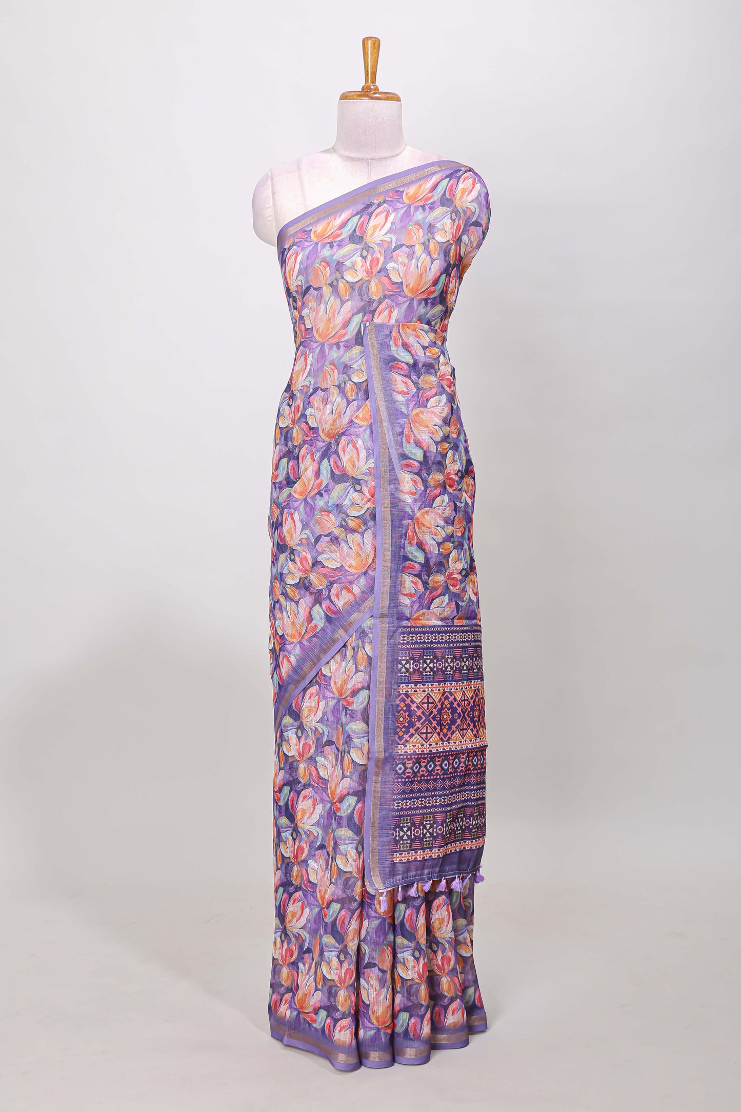 Lavender linen cotton saree with floral design and Ikkat motif pallu