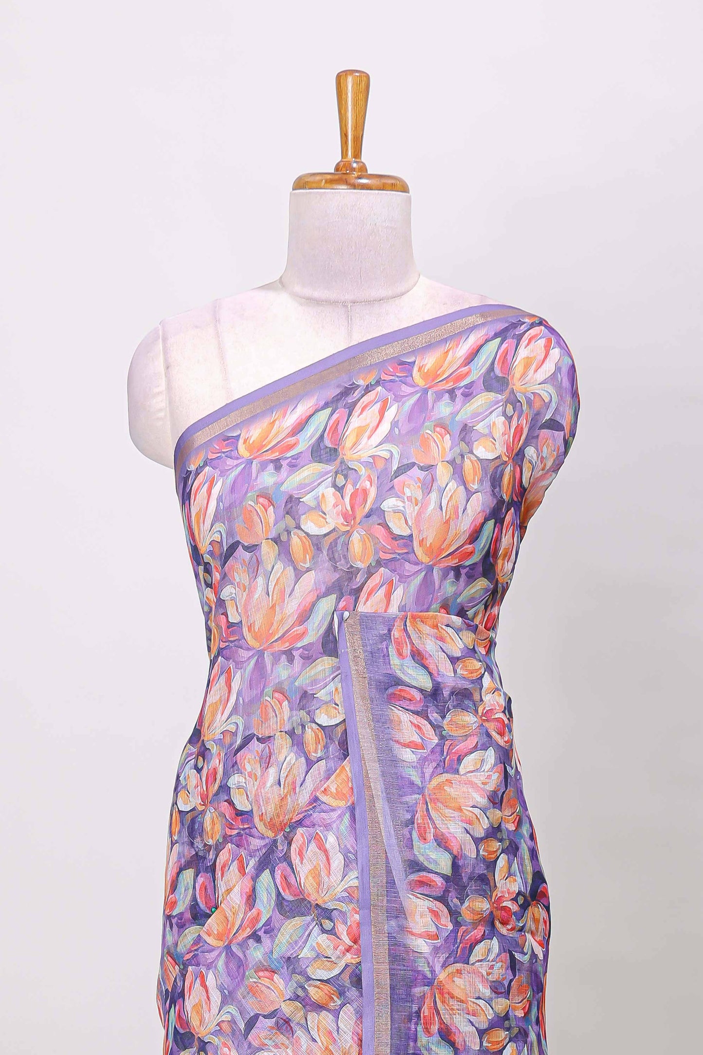 Lavender linen cotton saree with floral design and Ikkat motif pallu