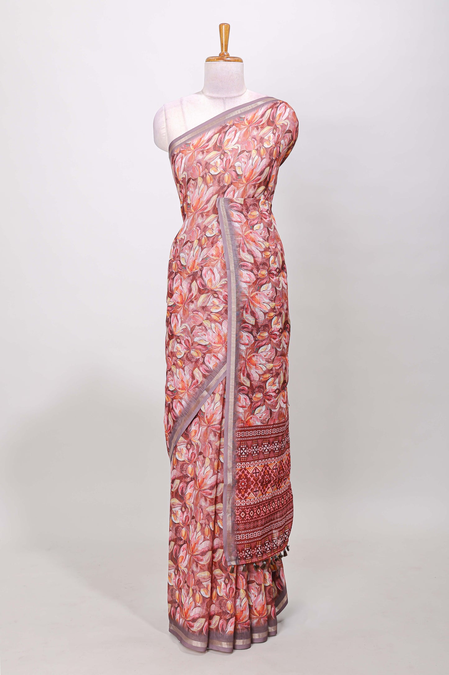 Pastel rose lilac linen cotton saree with floral design and Ikkat motif pallu