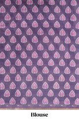 Purple lotus and crane birds motis linen cotton saree with ikkat style self zari border and pallu