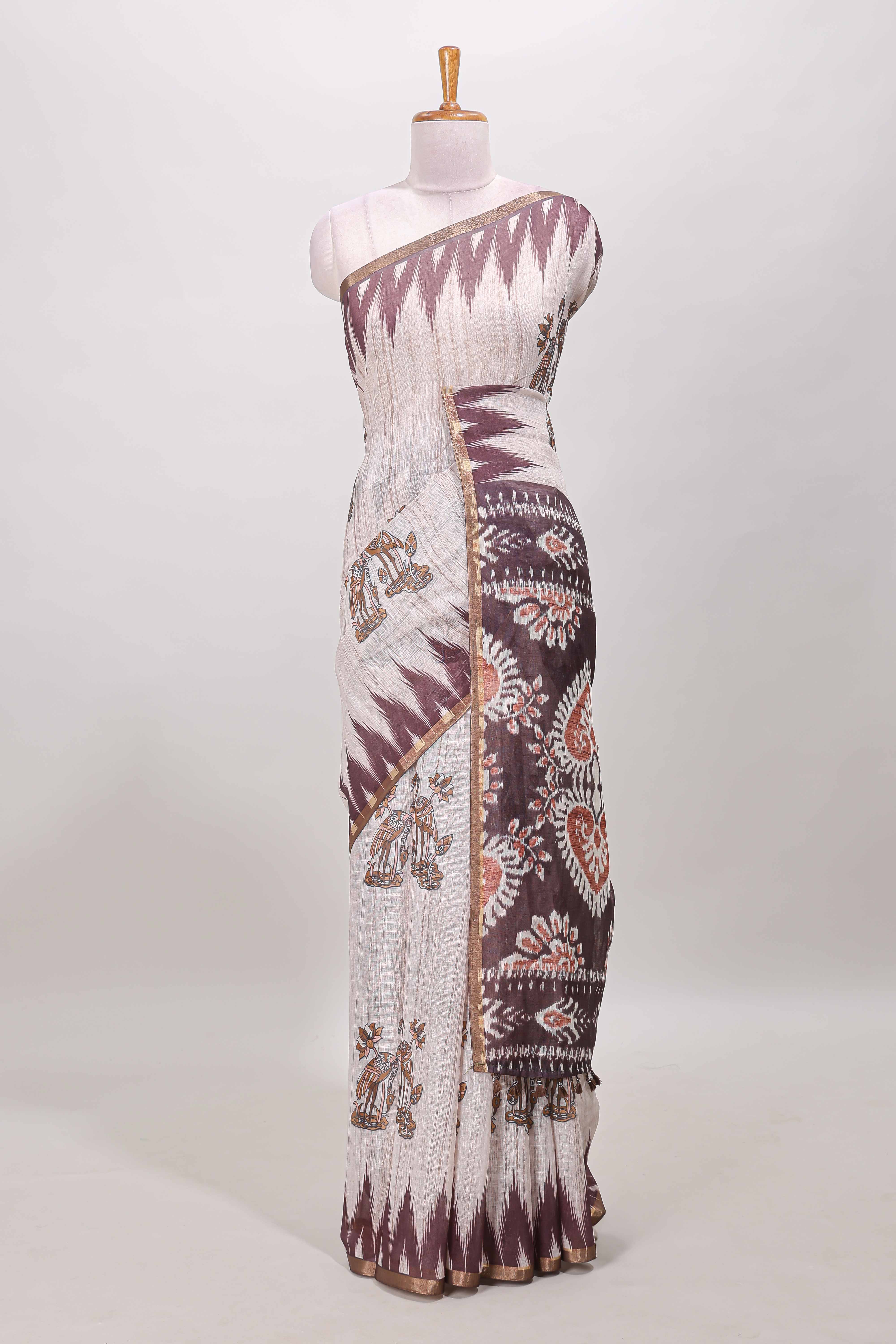 Brown lotus and crane birds motis linen cotton saree with ikkat style self zari border and pallu