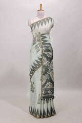 Green lotus and crane birds motis linen cotton saree with ikkat style self zari border and pallu