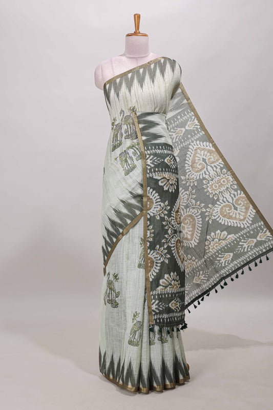 Green lotus and crane birds motis linen cotton saree with ikkat style self zari border and pallu