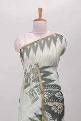 Green lotus and crane birds motis linen cotton saree with ikkat style self zari border and pallu