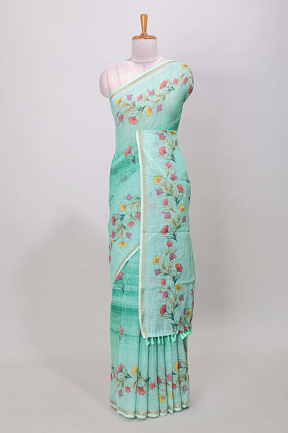 Green linen cotton saree with floral vines print, zari border and printed blouse