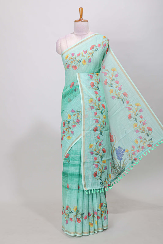 Green linen cotton saree with floral vines print, zari border and printed blouse