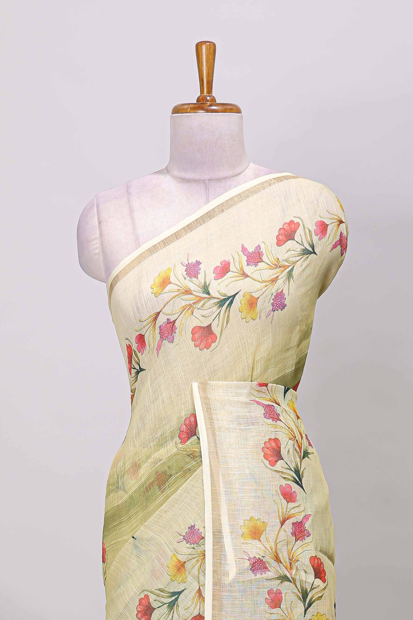 Green linen cotton saree with floral vines print, zari border and printed blouse