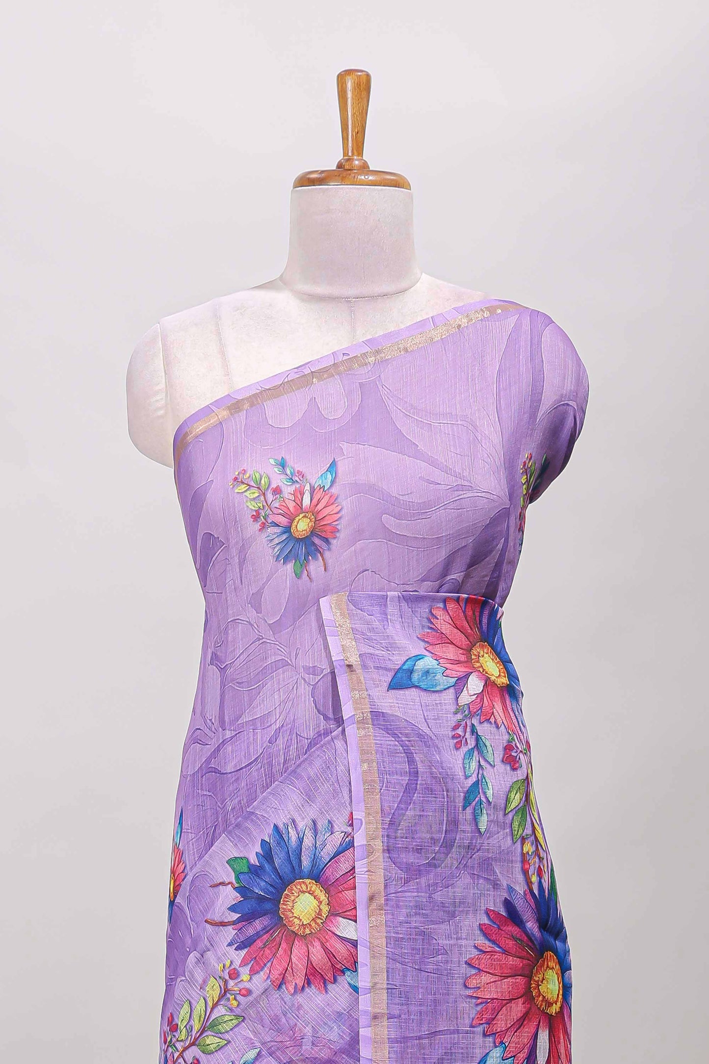 Lavender floral print linen cotton saree with self zari border and matching blouse