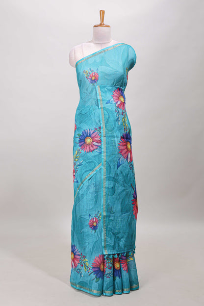 Turquoise green floral print linen cotton saree with self zari border and matching blouse