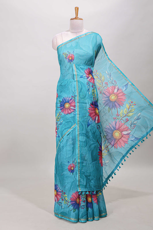 Turquoise green floral print linen cotton saree with self zari border and matching blouse