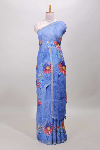 Blue floral print linen cotton saree with self zari border and matching blouse