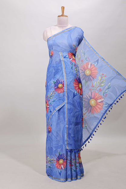 Blue floral print linen cotton saree with self zari border and matching blouse