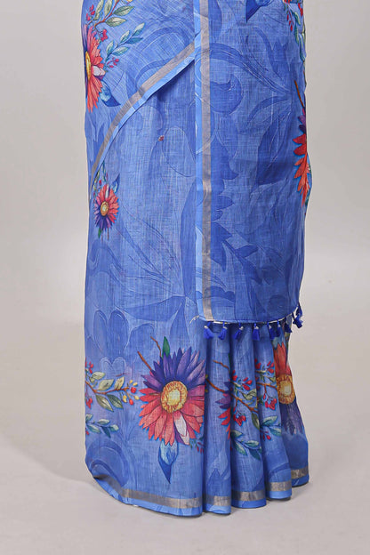 Blue floral print linen cotton saree with self zari border and matching blouse