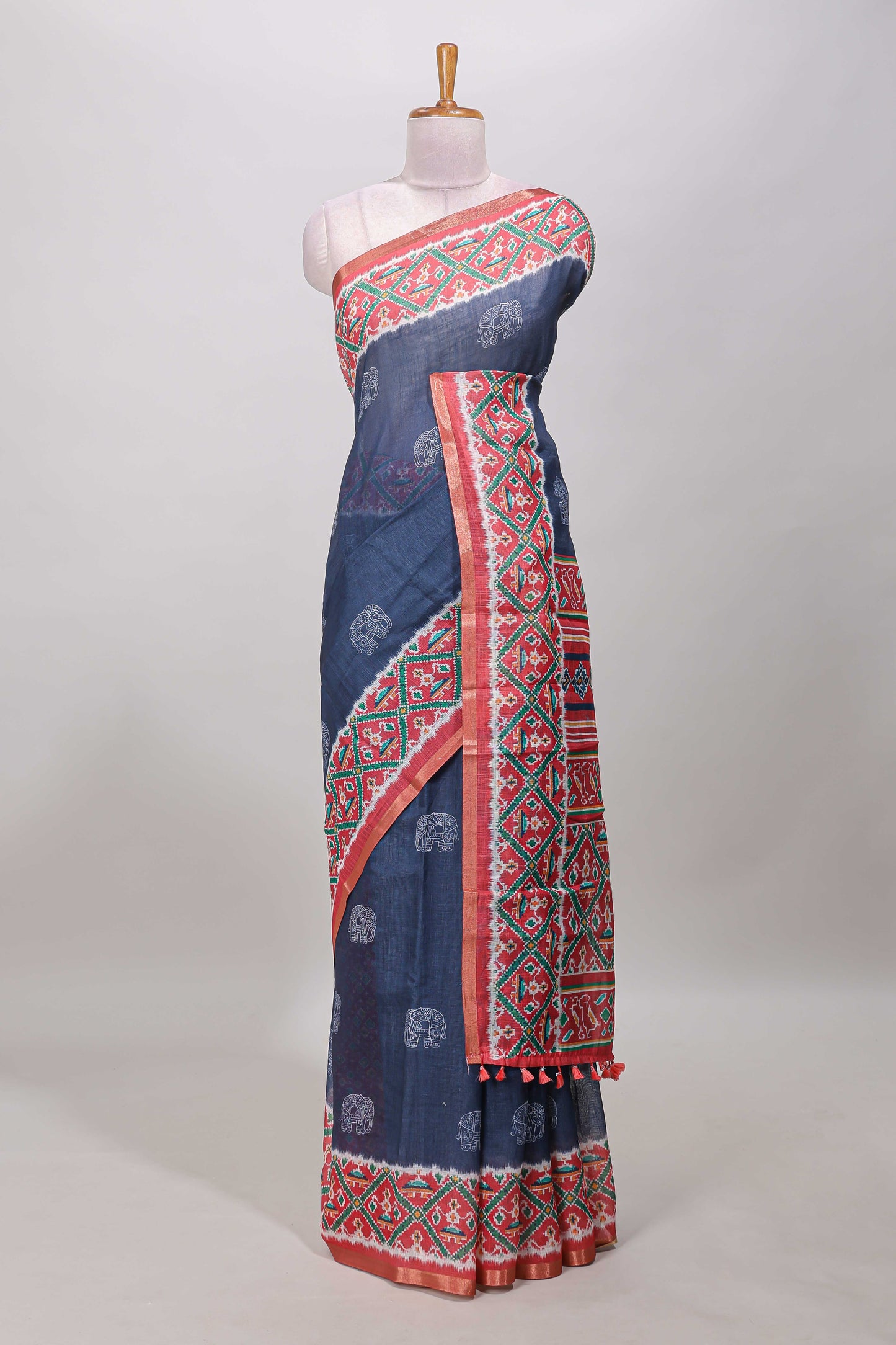 Blue elephant motifs linen cotton saree with contrast ikkat style border and printed blouse