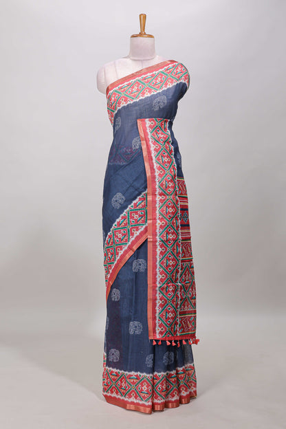 Blue elephant motifs linen cotton saree with contrast ikkat style border and printed blouse
