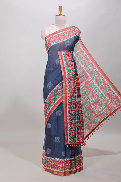 Blue elephant motifs linen cotton saree with contrast ikkat style border and printed blouse