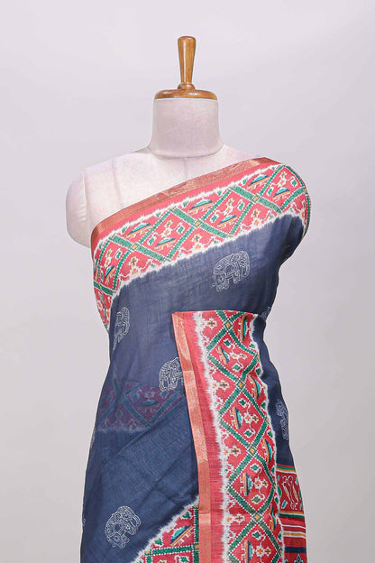 Blue elephant motifs linen cotton saree with contrast ikkat style border and printed blouse
