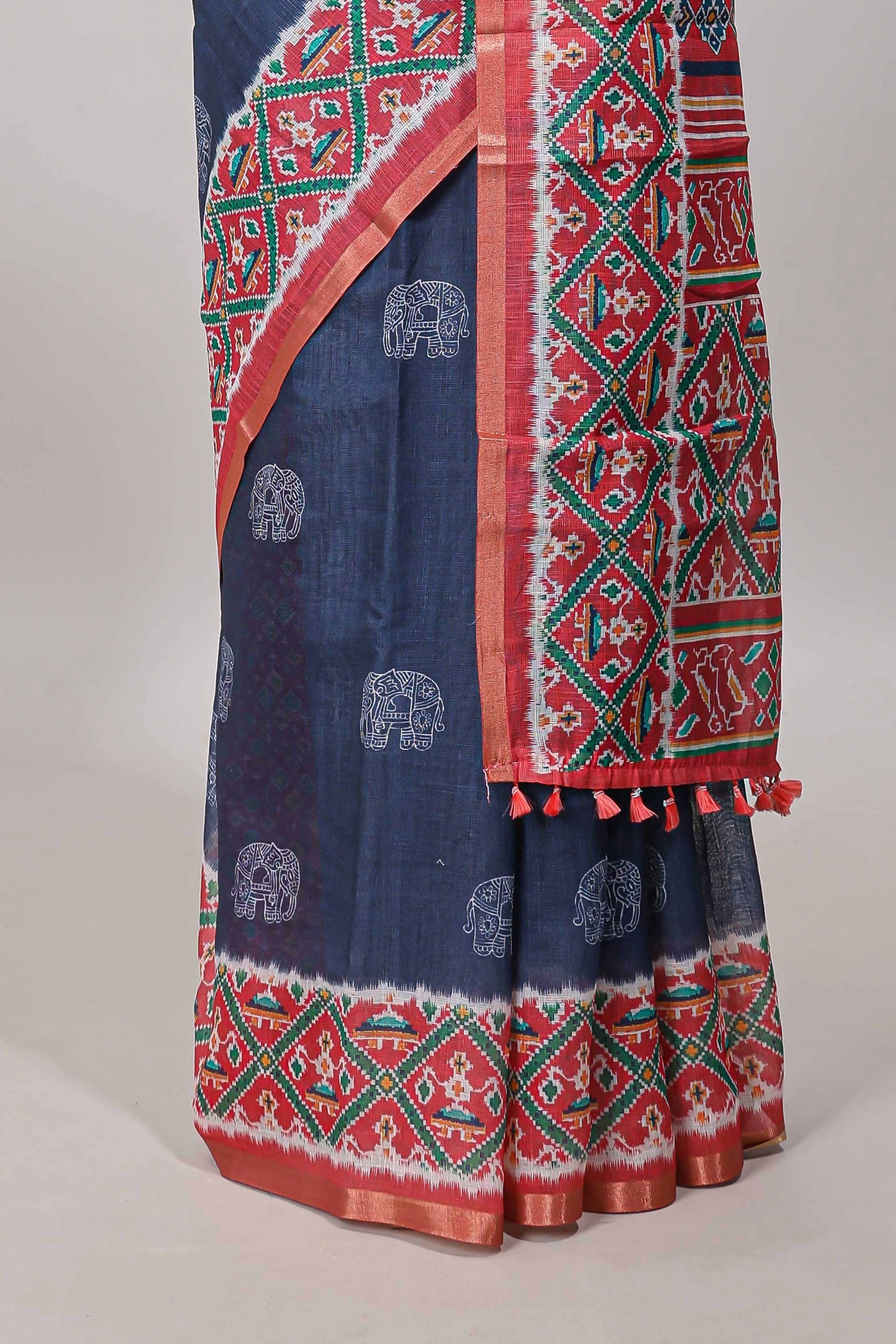Blue elephant motifs linen cotton saree with contrast ikkat style border and printed blouse