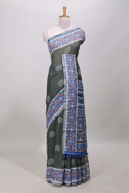 Forest green elephant motifs linen cotton saree with contrast ikkat style border and printed blouse
