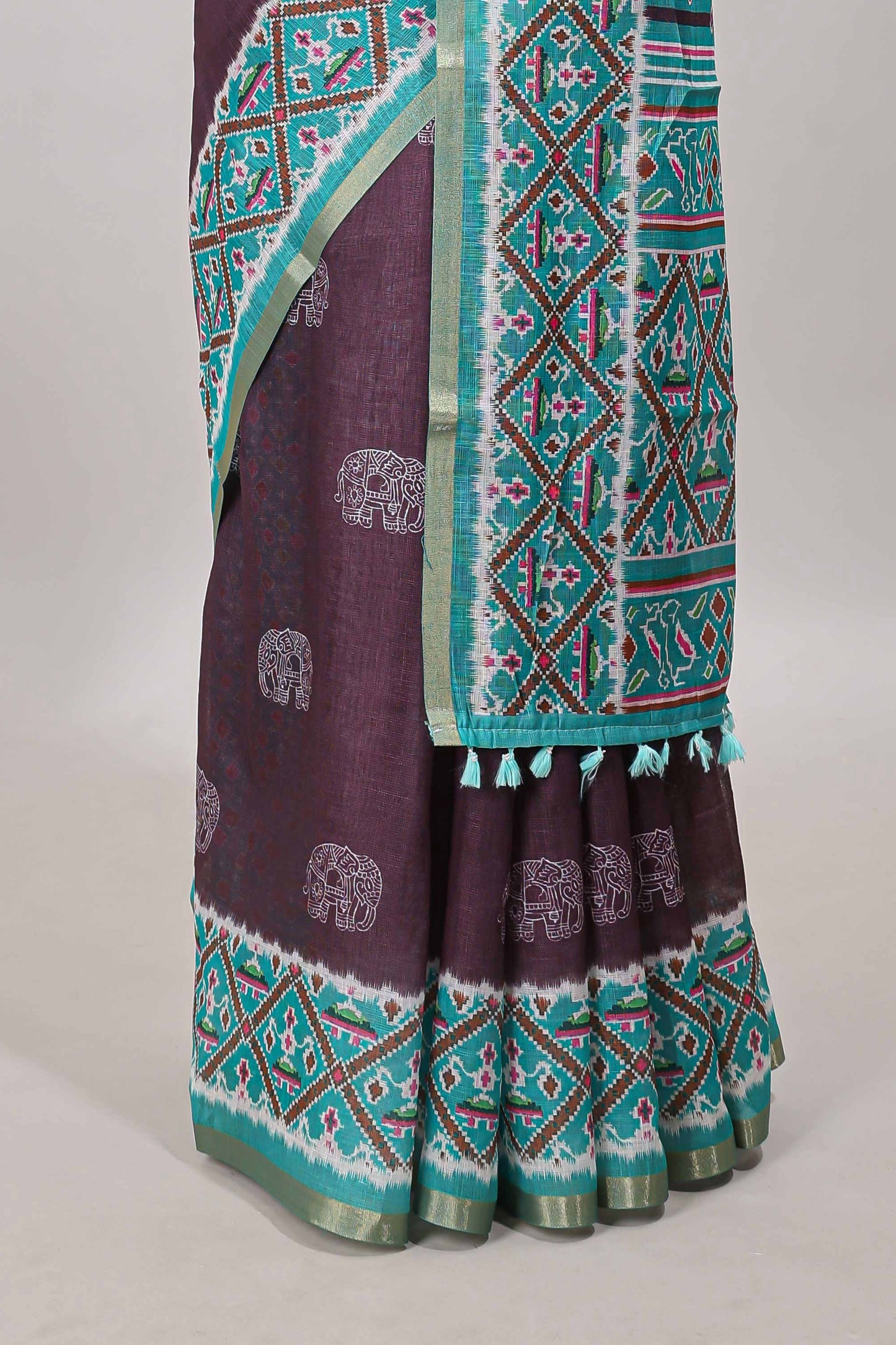 Plum violet elephant motifs linen cotton saree with contrast ikkat style border and printed blouse