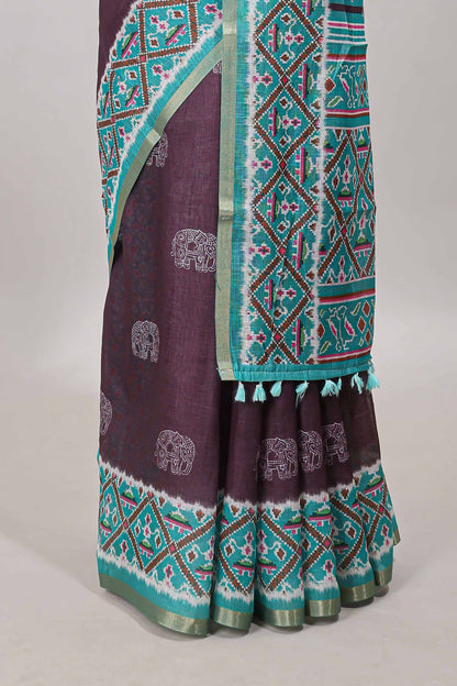 Plum violet elephant motifs linen cotton saree with contrast ikkat style border and printed blouse