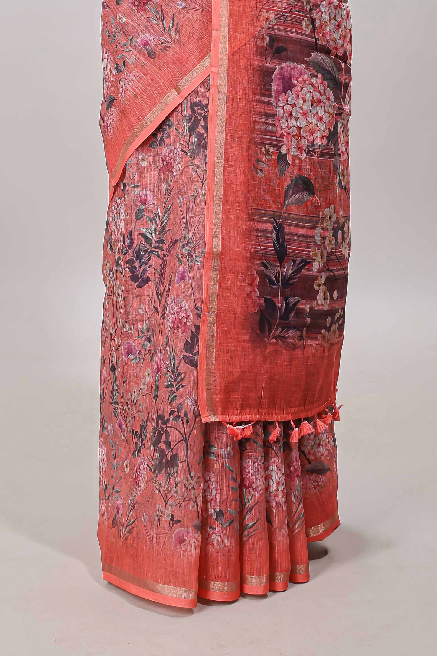 Orange floral design linen cotton saree with self zari border and floral printed pallu