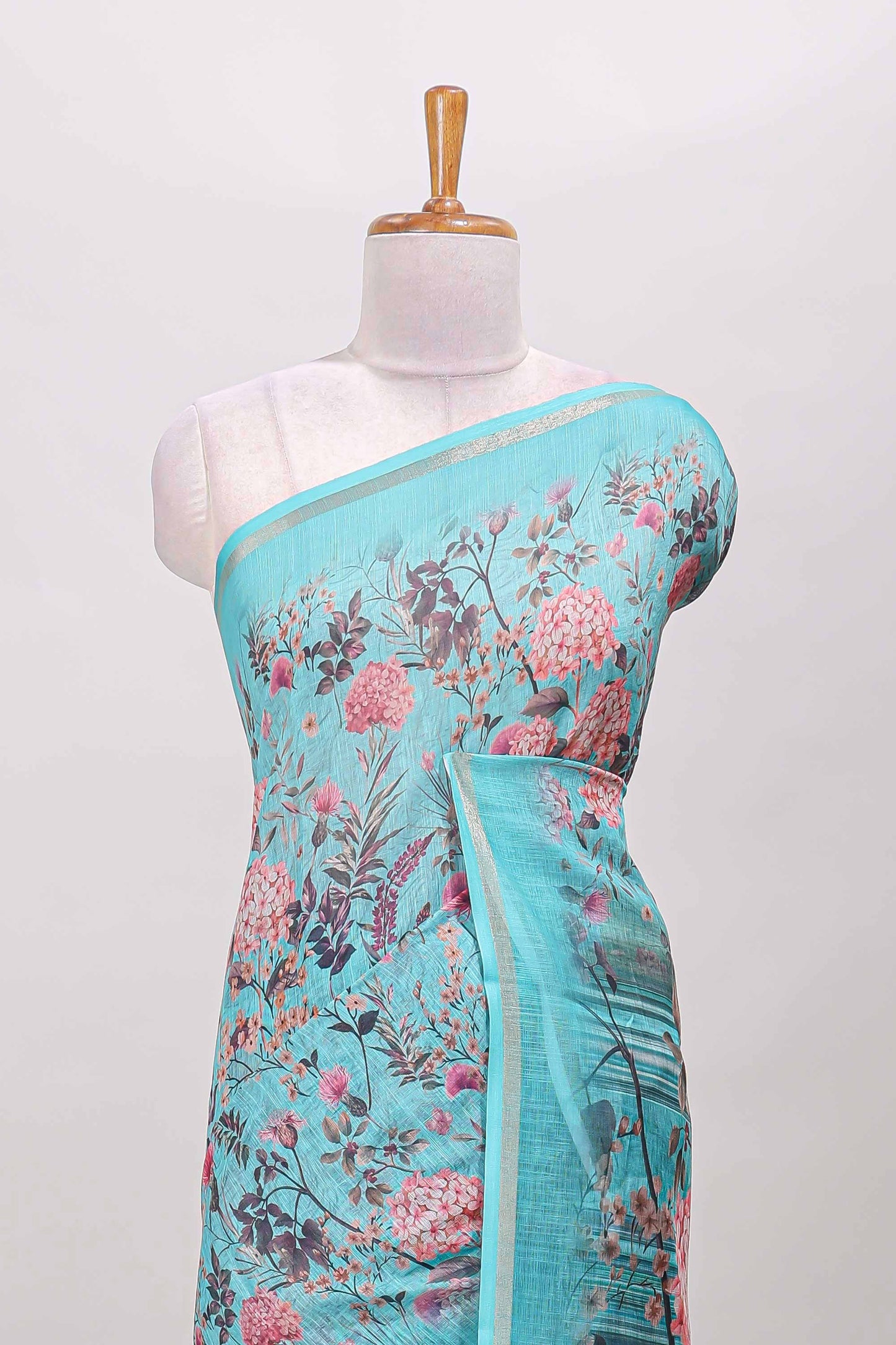 Blue floral design linen cotton saree with self zari border and floral printed pallu