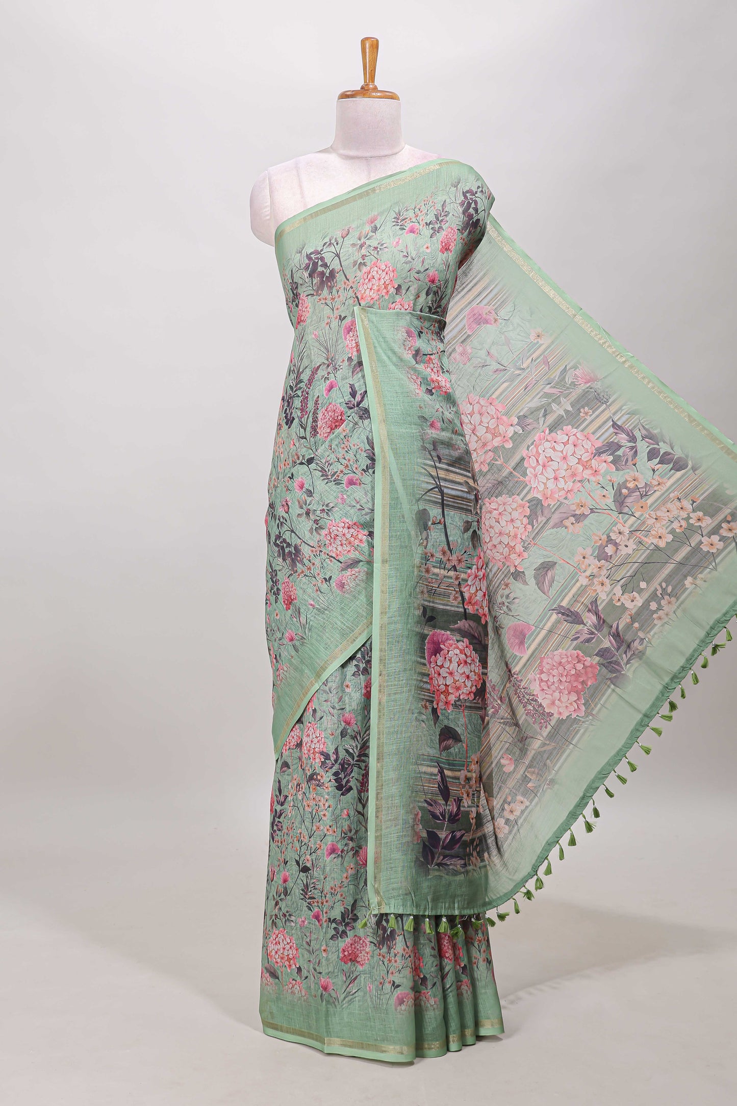 Green floral design linen cotton saree with self zari border and floral printed pallu