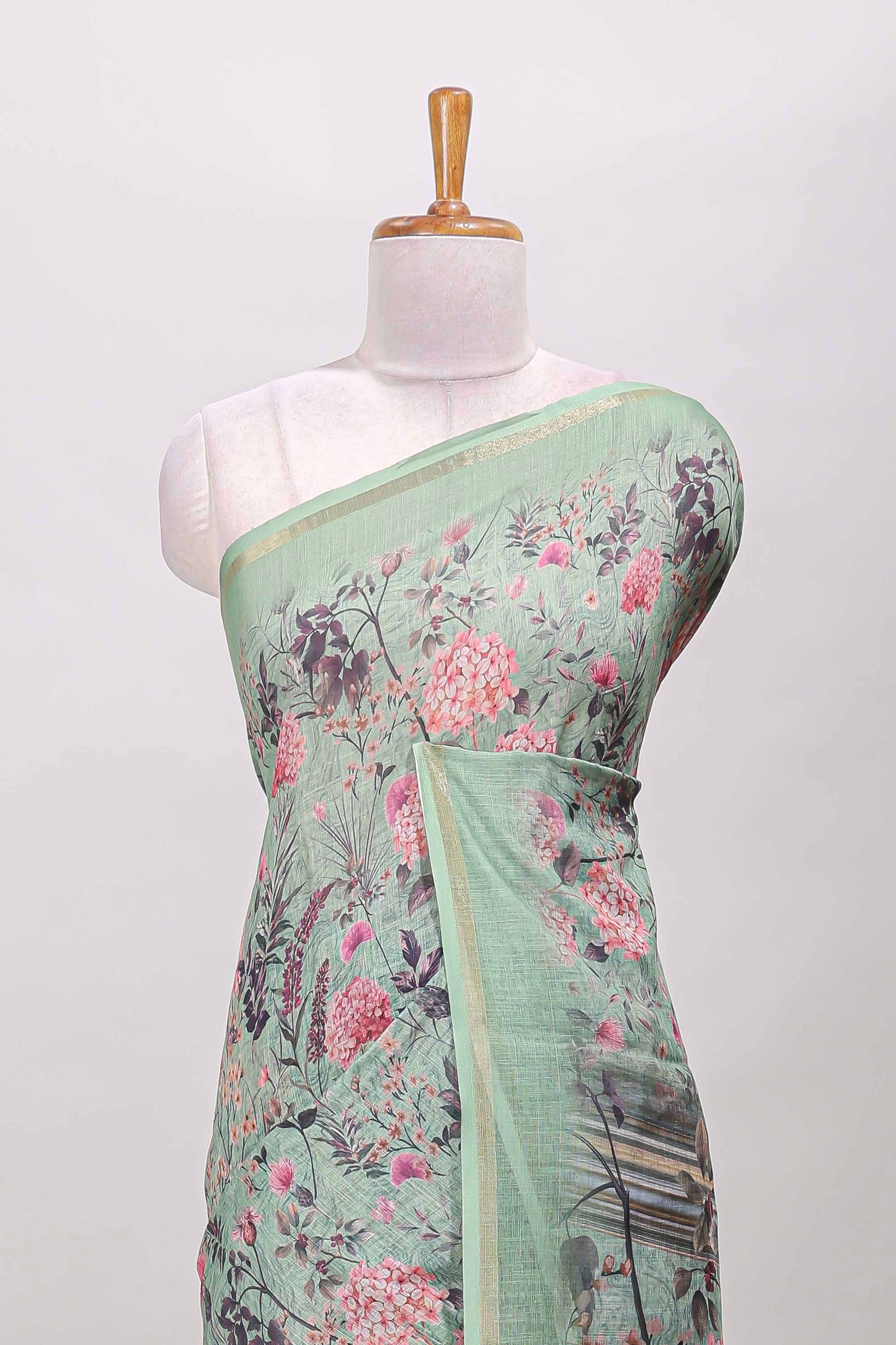 Green floral design linen cotton saree with self zari border and floral printed pallu