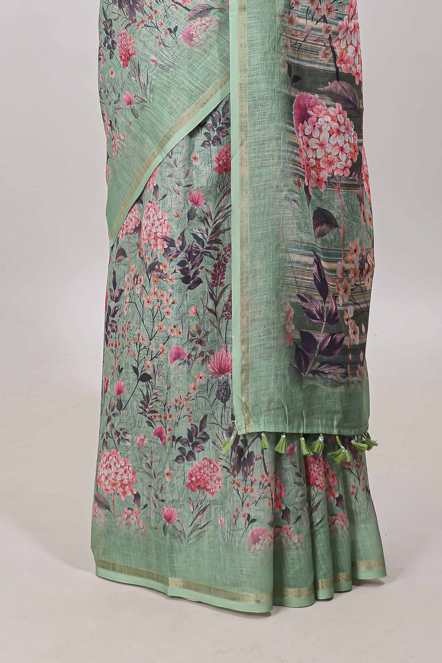 Green floral design linen cotton saree with self zari border and floral printed pallu