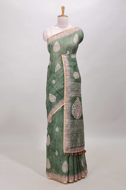 Green paisley motifs linen cotton saree with self zari border and matching blouse