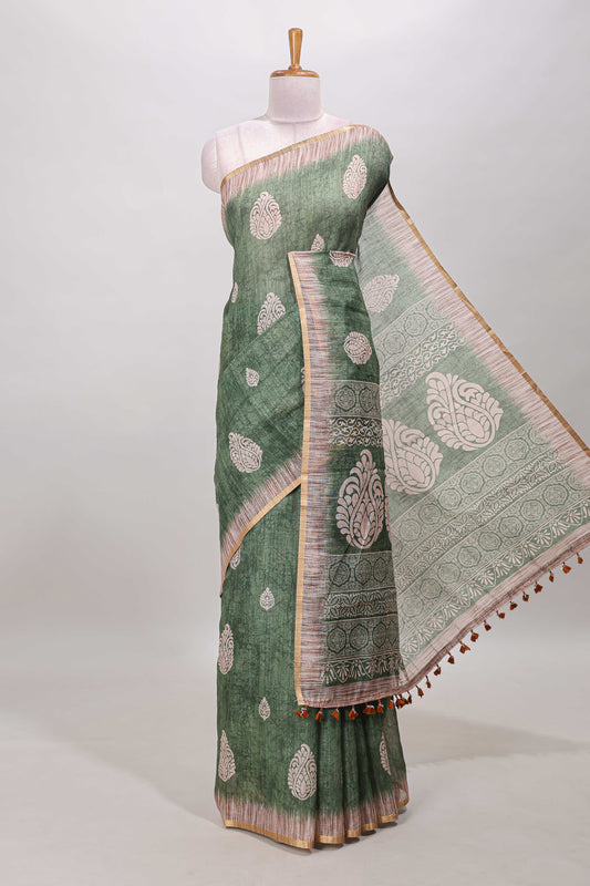 Green paisley motifs linen cotton saree with self zari border and matching blouse