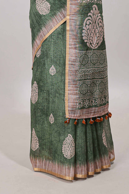 Green paisley motifs linen cotton saree with self zari border and matching blouse