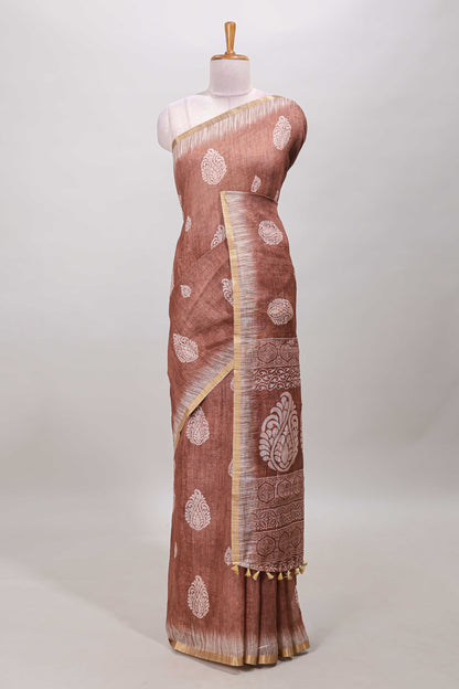 Brown paisley motifs linen cotton saree with self zari border and matching blouse