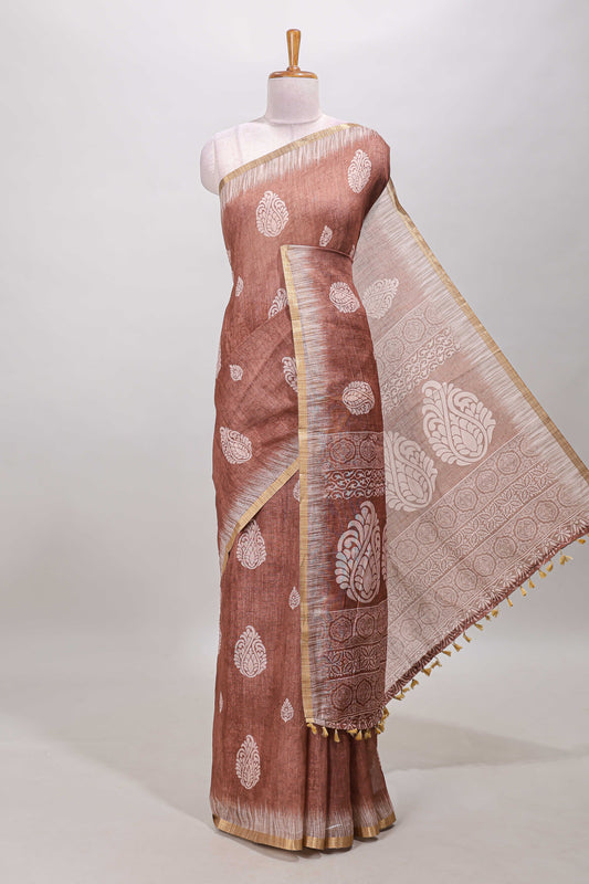 Brown paisley motifs linen cotton saree with self zari border and matching blouse