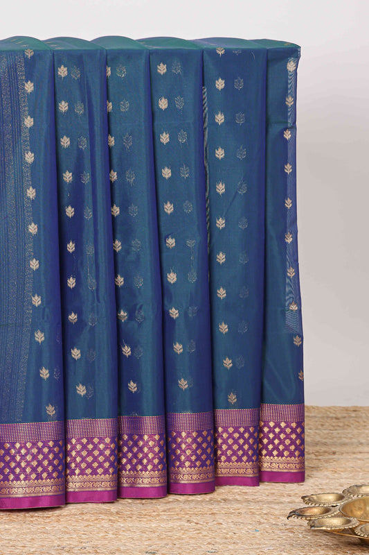 Blue floral zari butta semisilk cotton saree with contrast zari border and striped pallu