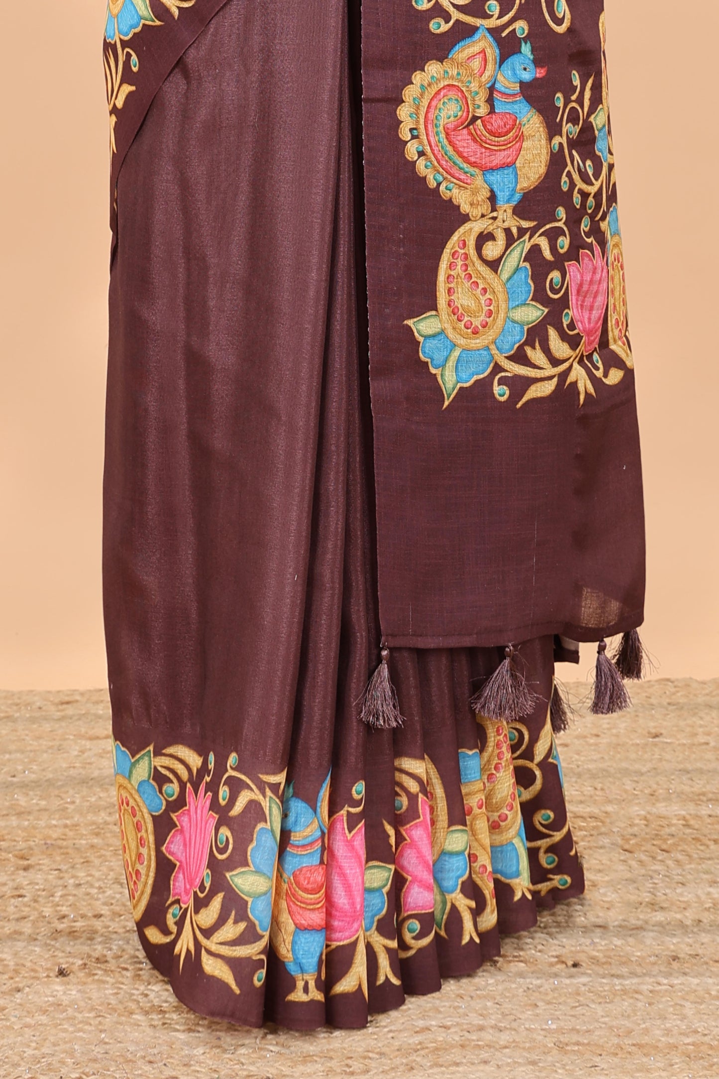 Brown tanjore painting style linen tussar saree with peacock & lotus motifs and printed pallu