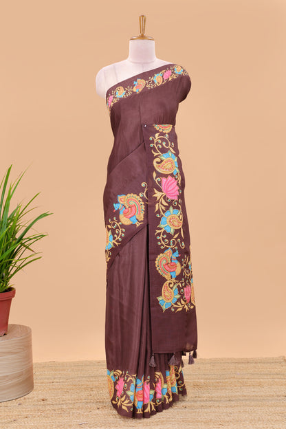 Brown tanjore painting style linen tussar saree with peacock & lotus motifs and printed pallu