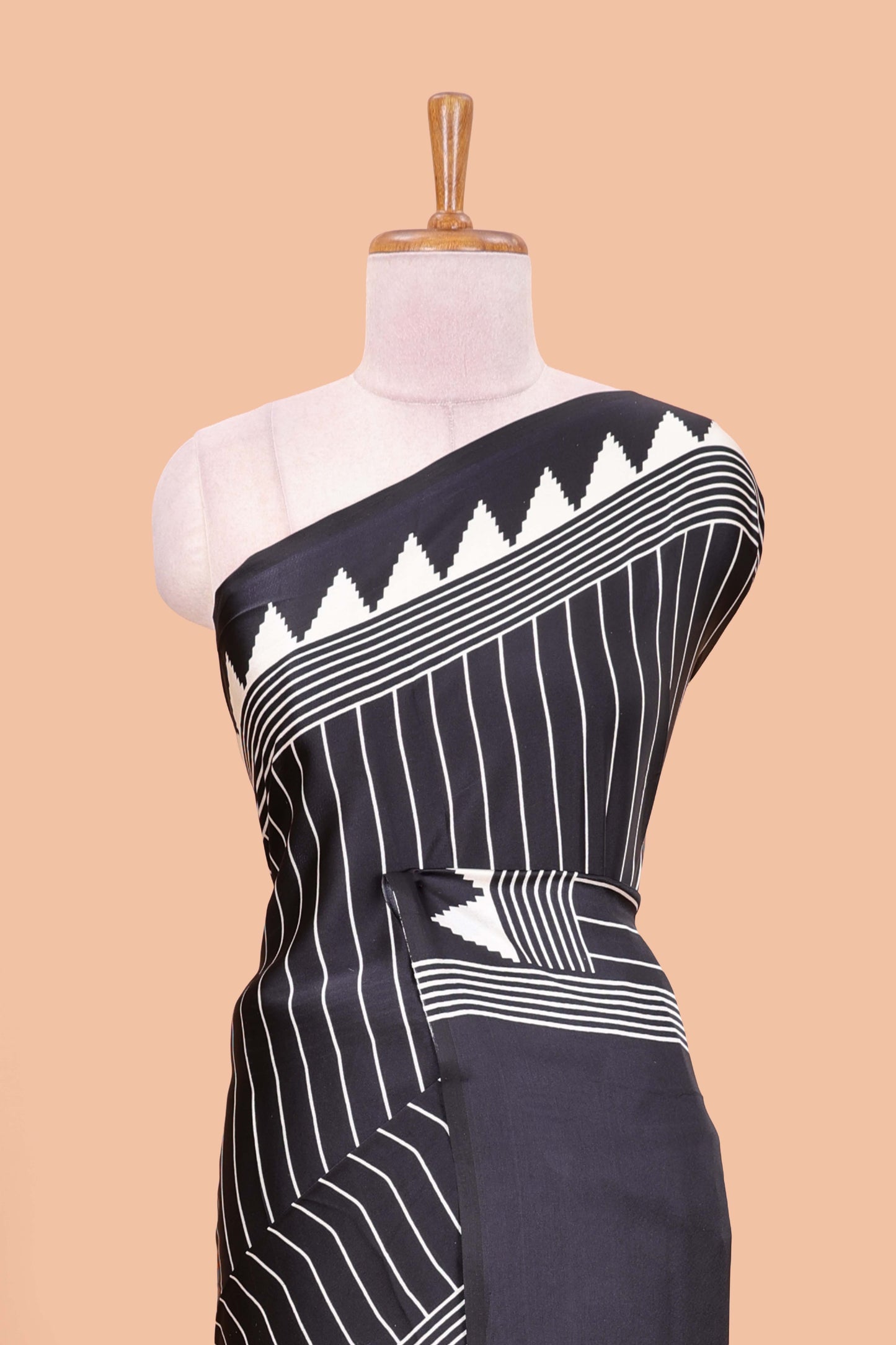 Black satin ajrakh modal printed saree with striped body and geometric print border and pallu